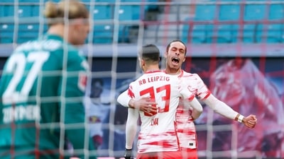 Andre Silva and Yussuf Poulsen celebrate after the former's opening goal during the Bundesliga match between RB Leipzig and FSV Mainz 05. (AP) Andre Silva and Yussuf Poulsen celebrate after the former's opening goal during the Bundesliga match between RB Leipzig and FSV Mainz 05. (AP)