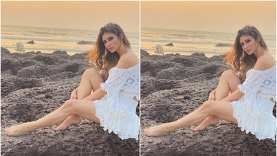 In the photos, Mouni wore an off-the-shoulder see-through top featuring intricate details. It comes with a plunging neckline, patterned embroidery, bell sleeves, smocked detail on the waistline, and scalloped borders on the cuff and hem. (Instagram/@imouniroy) In the photos, Mouni wore an off-the-shoulder see-through top featuring intricate details. It comes with a plunging neckline, patterned embroidery, bell sleeves, smocked detail on the waistline, and scalloped borders on the cuff and hem. (Instagram/@imouniroy)