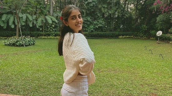 Navya Naveli Nanda shared pictures of herself posing on a lawn.