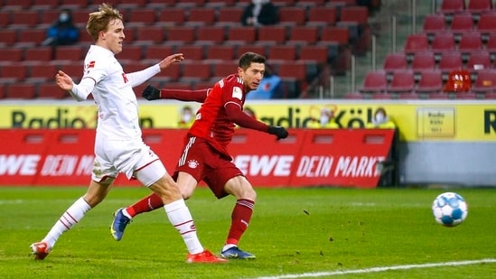 Bayern Munich's Robert Lewandowski scores the team's fourth goal to complete his hat-trick.&nbsp;(Reuters)