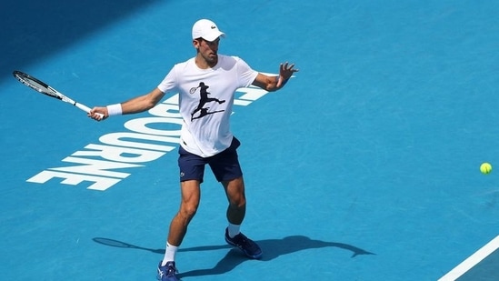 Serbian tennis player Novak Djokovic practices on Rod Laver Arena ahead of the 2022 Australian Open at Melbourne Park on January 11, 2022.&nbsp;(REUTERS)