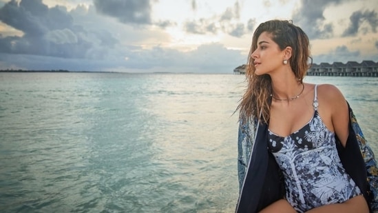 Ananya Panday in a Falguni Shane Peacock bikini and jacket.&nbsp;