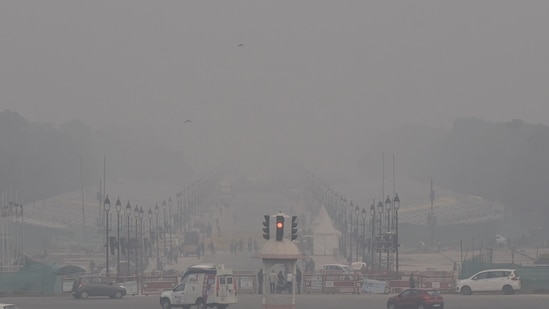 Dense fog engulfs Rajpath on a cold winter day, in New Delhi on Friday.(ANI)