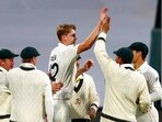 Australia's Cameron Green, center, celebrates with teammates taking the wicket of England's Zak Crawley during their Ashes Test at Hobart.(AP)