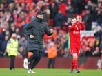Liverpool's manager Jurgen Klopp runs onto the pitch to celebrate at the end of an English Premier League soccer match between Liverpool and Brentford at Anfield in Liverpool,&nbsp;