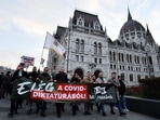 People demonstrate in front of the Parliament, during a protest against coronavirus disease (Covid-19) measures and vaccinations, in Budapest, Hungary, January 16, 2022.&nbsp;