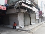 Shops in Delhi's Lajpat Nagar Market remain closed as weekend lockdown is going on in Delhi. (PTI) Shops in Delhi's Lajpat Nagar Market remain closed as weekend lockdown is going on in Delhi. (PTI)