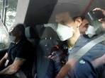 Serbian tennis player Novak Djokovic departs the Park Hotel while under immigration detention, to convene with his legal team after his visa to play in the Australian Open was cancelled a second time, in Melbourne, Australia, January 16, 2022.