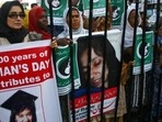 People rally demanding the release of Aafia Siddiqui, who was convicted in February 2010 of two counts of attempted murder, and who is currently being detained in the U.S. during International Women's Day in Karachi, Pakistan.(AP) People rally demanding the release of Aafia Siddiqui, who was convicted in February 2010 of two counts of attempted murder, and who is currently being detained in the U.S. during International Women's Day in Karachi, Pakistan.(AP)