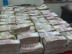 Police recovered over <span class='webrupee'>₹</span>4,50,00,000 in old rupee notes during the raids.