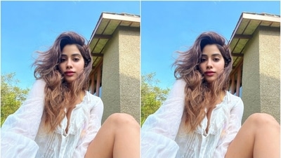 Janhvi donned a see-through embroidered white crinkled shirt in this click. It features a plunging neckline with connected ribbon ties, open front, long sleeves with gathered cuffs and a midriff-baring cropped length. (Instagram/@janhvikapoor)