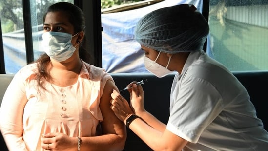 A woman gets her vaccine against Covid-19 at a mobile facility in CBD Belapur, Navi Mumbai. (Representational image)(BACHCHAN KUMAR/HT PHOTO)