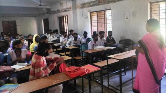 Class 10 students during a class in Phiringia village’s ‘Upgraded high school’. (HT Photo)