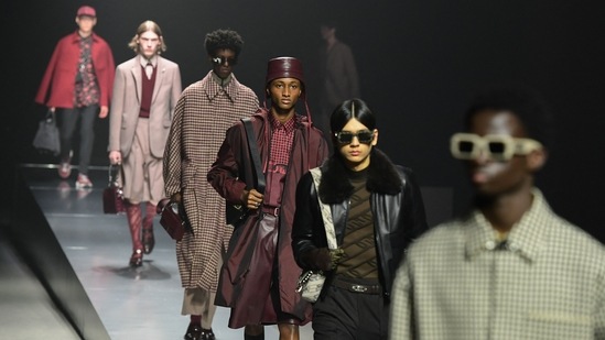 Models present creations for Fendi's Men's Fall/Winter 2022/2023 fashion collection(AFP)