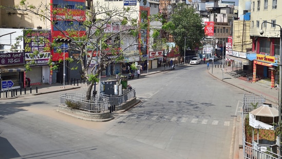 Bengaluru's Majestic Circle during the weekend curfew on Sunday. (PTI) Bengaluru's Majestic Circle during the weekend curfew on Sunday. (PTI)
