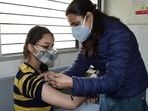 A medic administers Covid vaccine to a teen in Ludhiana at the civil surgeon’s office. (Representational image) A medic administers Covid vaccine to a teen in Ludhiana at the civil surgeon’s office. (Representational image)
