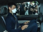 Serbian tennis player Novak Djokovic rides in car as he leaves a government detention facility before attending a court hearing at his lawyers office in Melbourne, Australia, Sunday, Jan. 16, 2022.(AP) Serbian tennis player Novak Djokovic rides in car as he leaves a government detention facility before attending a court hearing at his lawyers office in Melbourne, Australia, Sunday, Jan. 16, 2022.(AP)