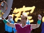 Rafael Nadal of Spain celebrates after defeating Marcos Giron of the U.S. in their first round match at the Australian Open tennis championships in Melbourne, Australia, Monday, Jan. 17, 2022. (AP)