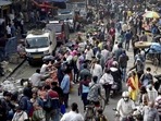 People visit a crowded wholesale market amid concerns over the spread of Covid-19 in Kolkata on Monday, January 17, 2022. (PTI) People visit a crowded wholesale market amid concerns over the spread of Covid-19 in Kolkata on Monday, January 17, 2022. (PTI)