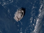 A plume rises over Tonga when the underwater volcano Hunga Tonga-Hunga Ha'apai erupted, in this satellite image taken by a Japanese weather satellite on Sunday.