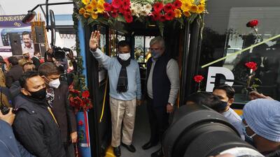 Delhi chief minister Arvind Kejriwal and transport minister Kailash Gahlot inspect the DTC electric bus, at Indraprastha depot on Monday. (Raj K Raj/HT) Delhi chief minister Arvind Kejriwal and transport minister Kailash Gahlot inspect the DTC electric bus, at Indraprastha depot on Monday. (Raj K Raj/HT)
