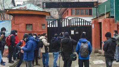 Media personnel assemble outside the Kashmir Press Club building after the J&K administration took back the premises, in Srinagar on Monday. (PTI) Media personnel assemble outside the Kashmir Press Club building after the J&K administration took back the premises, in Srinagar on Monday. (PTI)