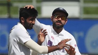 India's Jasprit Bumrah celebrates with Virat Kohli after taking the wicket of South Africa's Keegan Petersen (REUTERS)