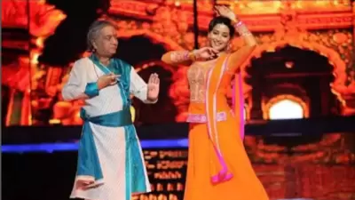 Madhuri Dixit shares a throwback picture with Pandit Birju Maharaj. Madhuri Dixit shares a throwback picture with Pandit Birju Maharaj.