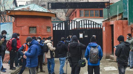 Media personnel assemble outside the Kashmir Press Club building after the J&K administration took back the premises, in Srinagar on Monday. (PTI)