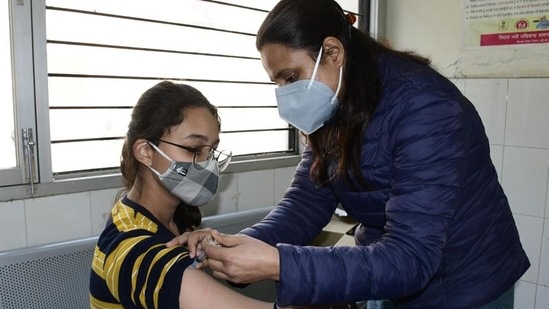 A medic administers Covid vaccine to a teen in Ludhiana at the civil surgeon’s office. (Representational image) A medic administers Covid vaccine to a teen in Ludhiana at the civil surgeon’s office. (Representational image)