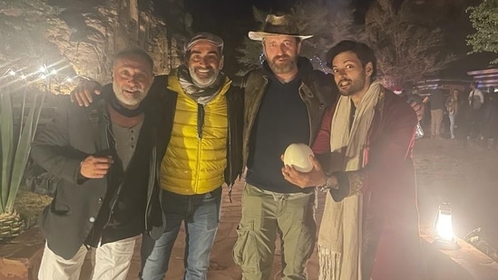 Ali Fazal on the sets of Kandahar with his co-stars.