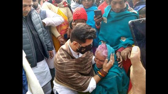 LJP (Ram Vilas) chief Chirag Paswan consoles affected families of a hooch tragedy in Nalanda on Monday. (PTI)