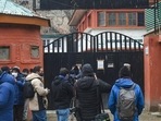 Media personnel assemble outside the Kashmir Press Club building after the Jammu and Kashmir government took back the premises, in Srinagar.(PTI) Media personnel assemble outside the Kashmir Press Club building after the Jammu and Kashmir government took back the premises, in Srinagar.(PTI)