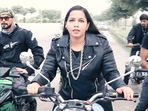 A screengrab from the music video of Dhinchak Pooja's new song ‘I’m a Biker.' A screengrab from the music video of Dhinchak Pooja's new song ‘I’m a Biker.' 