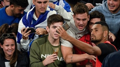 Nick Kyrgios of Australia takes a selfie with the crowd after defeating Liam Broady of Britain in their first round match at the Australian Open tennis championships in Melbourne, Australia, Tuesday, Jan. 18, 2022. (AP) Nick Kyrgios of Australia takes a selfie with the crowd after defeating Liam Broady of Britain in their first round match at the Australian Open tennis championships in Melbourne, Australia, Tuesday, Jan. 18, 2022. (AP)