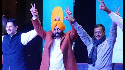 Punjab Aam Aadmi Party president Bhagwant Mann with AAP national convener Arvind Kejriwal after he was named the party’s chief ministerial candidate in Mohali on Tuesday. (Ravi Kumar/HT) Punjab Aam Aadmi Party president Bhagwant Mann with AAP national convener Arvind Kejriwal after he was named the party’s chief ministerial candidate in Mohali on Tuesday. (Ravi Kumar/HT)