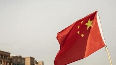 A Chinese flag flies outside the east gate of the Old City in Kashgar, Xinjiang. Image used for representational purpose only. (Photo: Bloomberg) A Chinese flag flies outside the east gate of the Old City in Kashgar, Xinjiang. Image used for representational purpose only. (Photo: Bloomberg)
