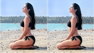 Sonal teamed the top with matching low-rise bikini bottoms featuring ribbon ties on both sides connected with gold metal rings. She layered a white cotton oversized shirt with floral applique work and folded sleeves over the swimsuit to complete her ensemble. (Instagram/@sonalchauhan) Sonal teamed the top with matching low-rise bikini bottoms featuring ribbon ties on both sides connected with gold metal rings. She layered a white cotton oversized shirt with floral applique work and folded sleeves over the swimsuit to complete her ensemble. (Instagram/@sonalchauhan)