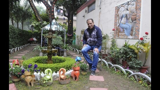 Naresh Kohli, a resident of Sector 29, and an employee of the Chandigarh administration, has taken inspiration from Nek Chand and created artefacts for his garden using old tyres, kids’ toys, cycle parts, spoons and broken crockery. (Keshav Singh/HT)