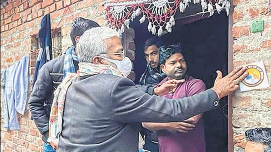 UP BJP president Swatantra Dev Singh during party's door-to-door campaign for the Uttar Pradesh assembly elections, in Lucknow. The party has formed committees to strengthen its campaign in five poll-bound states. (PTI)