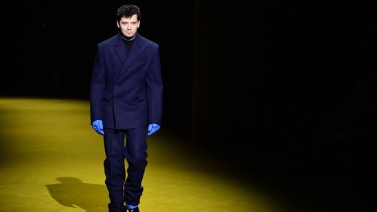 British actor Asa Butterfield presents a creation for Prada's Men's Fall/Winter 2022/2023 collection.&nbsp;(AFP)