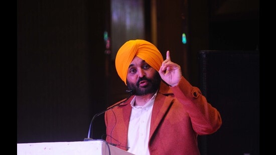 AAP Punjab chief minister candidate Bhagwant Mann interacts with the media and supporters after he was declared the party’s CM face for the elections, in Mohali on Tuesday. (Ravi Kumar/HT photo)