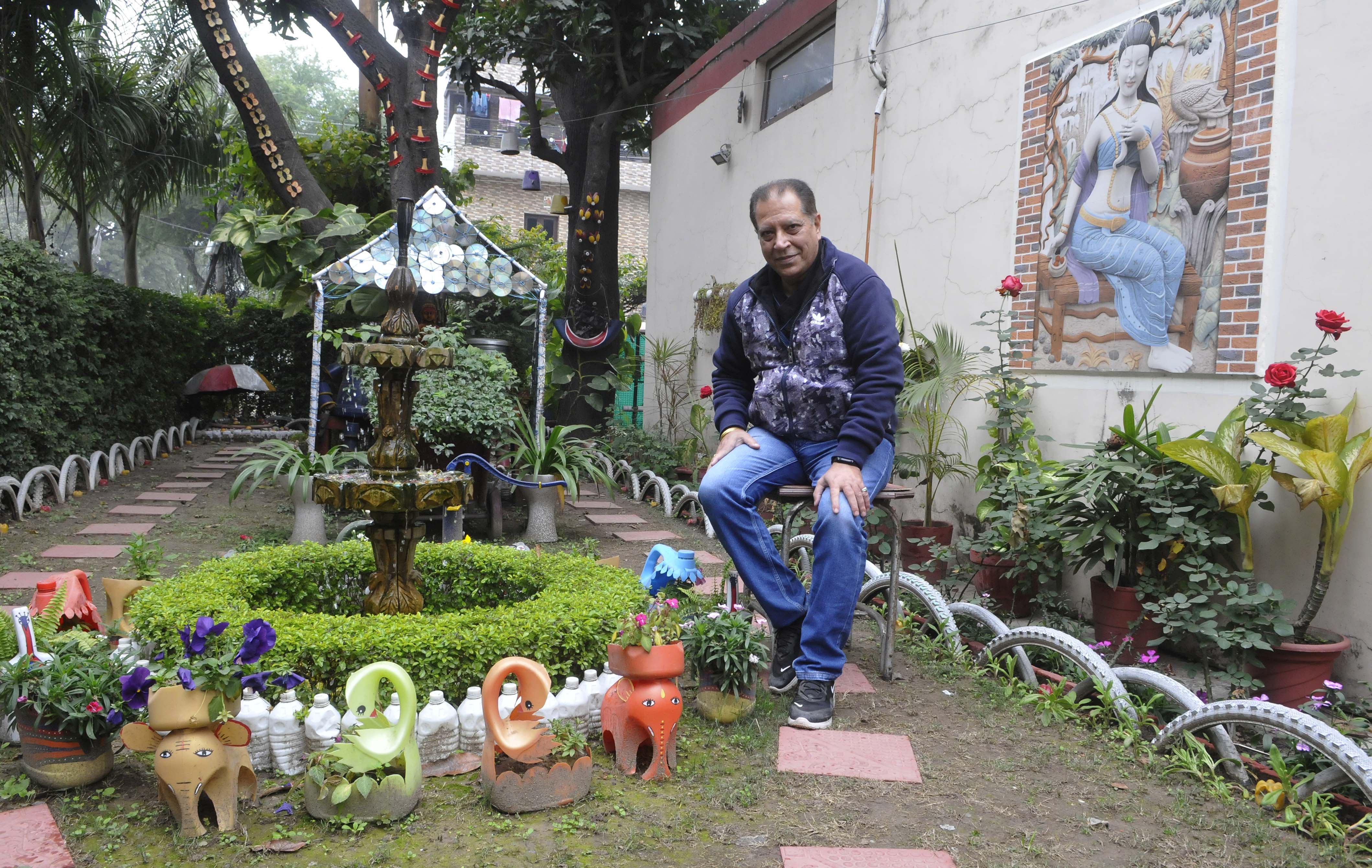Naresh Kohli, a resident of Sector 29, and an employee of the Chandigarh administration, has taken inspiration from Nek Chand and created artefacts for his garden using old tyres, kids’ toys, cycle parts, spoons and broken crockery. (Keshav Singh/HT)