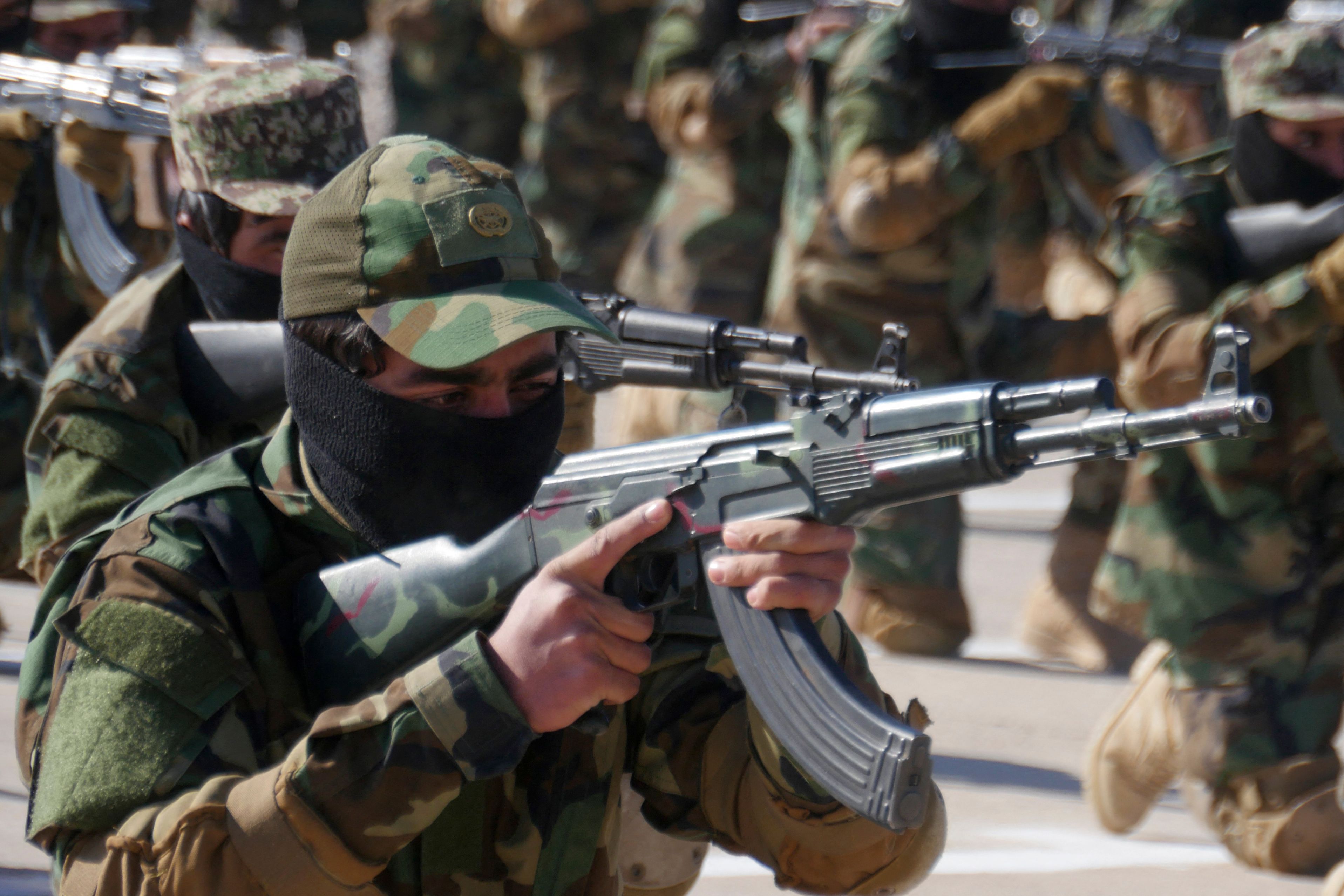 Taliban fighters demonstrate their skills during a graduation ceremony of Taliban Fighters after a three months military training in Herat on January 10, 2022. (AFP) Taliban fighters demonstrate their skills during a graduation ceremony of Taliban Fighters after a three months military training in Herat on January 10, 2022. (AFP)