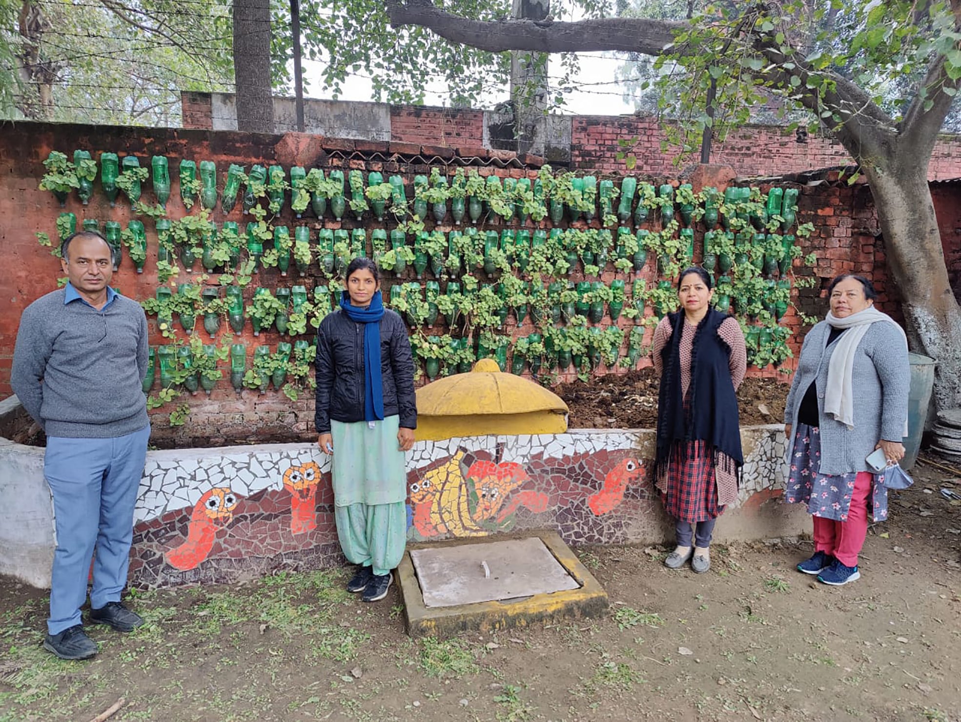 Principal of Government Model Senior Secondary School, Dhanas, Seema Girdhar (second from right) and her team. (HT Photo)
