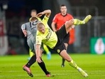 Erling Haaland falls during the German Soccer Cup match between FC St. Pauli and Borussia Dortmund in Hamburg, Germany(AP) Erling Haaland falls during the German Soccer Cup match between FC St. Pauli and Borussia Dortmund in Hamburg, Germany(AP)