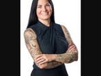 The image shows the woman who shared the post about the tattoo-related comment by her boss.
