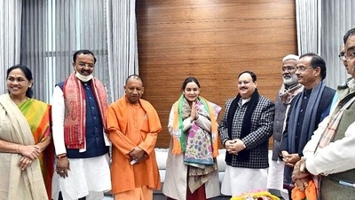 Aparna Yadav with UP CM Yogi Adityanath and top BJP leadership (Twitter/Yogi Adityanath) Aparna Yadav with UP CM Yogi Adityanath and top BJP leadership (Twitter/Yogi Adityanath)