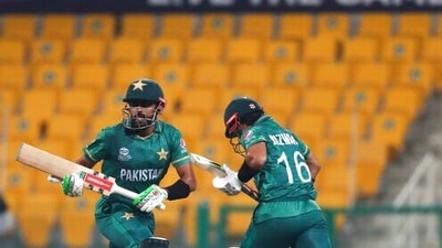 Pakistan's Mohammad Rizwan, right, and captain Babar Azam run between wickets during the Cricket Twenty20 World Cup match between Pakistan and Namibia. (AP) Pakistan's Mohammad Rizwan, right, and captain Babar Azam run between wickets during the Cricket Twenty20 World Cup match between Pakistan and Namibia. (AP)