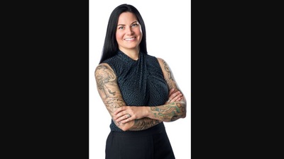 The image shows the woman who shared the post about the tattoo-related comment by her boss. (LinkedIn/@Jessica Hanzie Leonard,)